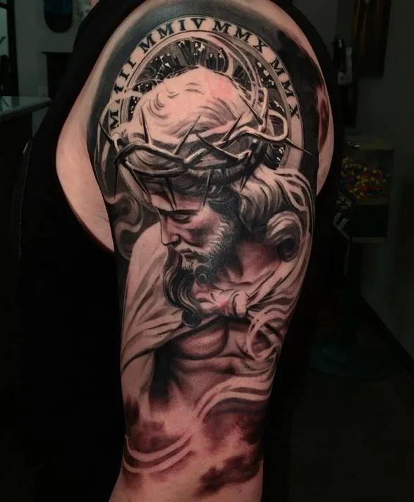 Full-sleeve Jesus tattoo with Crown of thorns