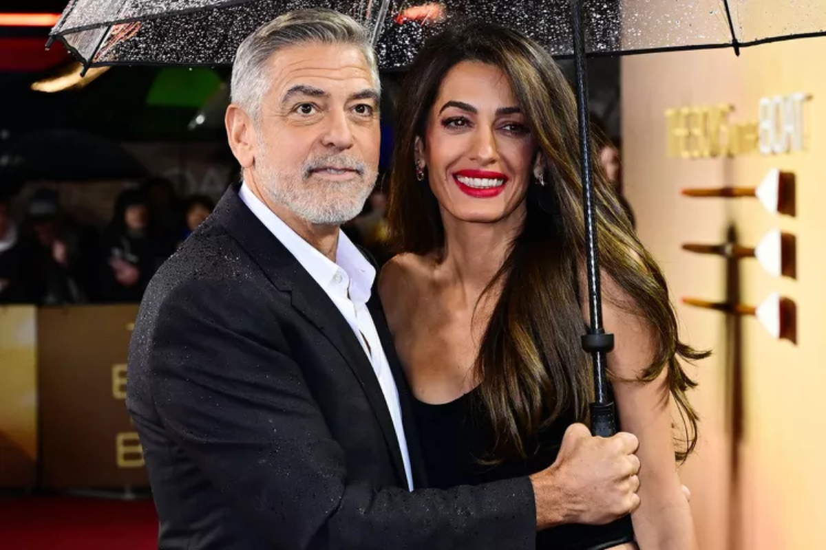 Clooney Brave Rain at 'Boys in Boat' Premiere