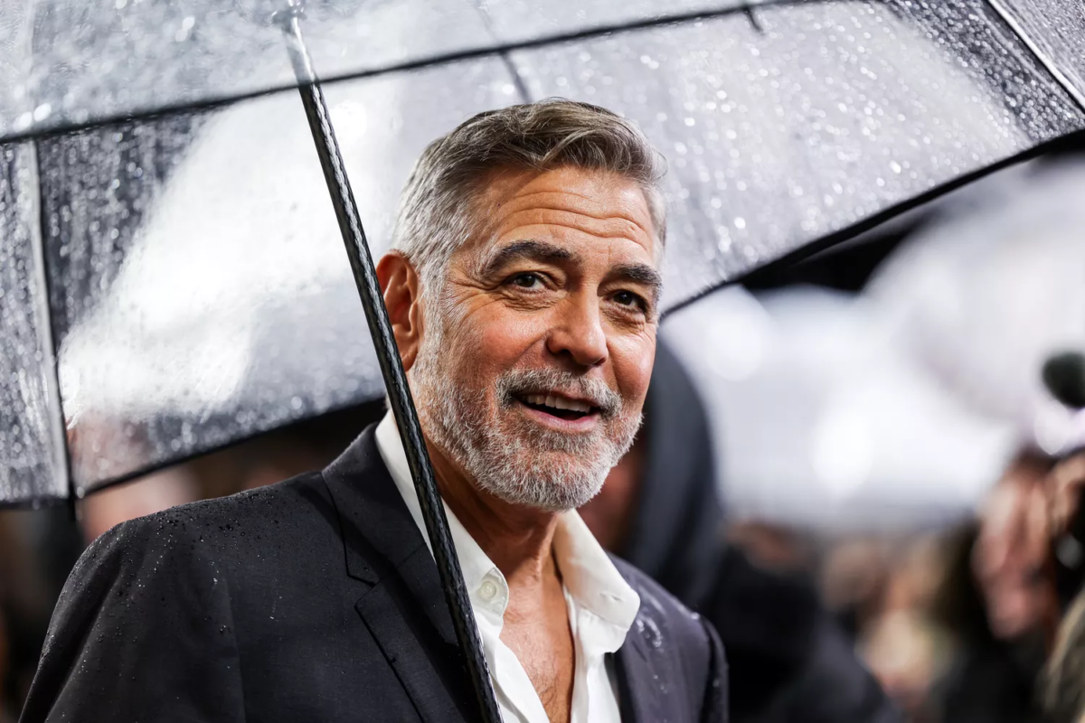 Clooney Brave Rain at 'Boys in Boat' Premiere